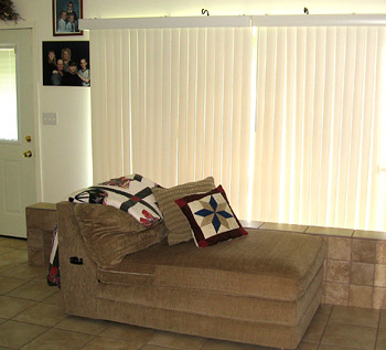 Inside the finished house, showing the knee-wall below the windows