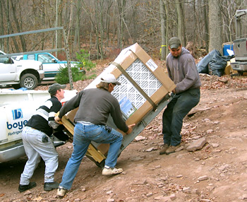 Bringing in the geothermal heat exchanger unit