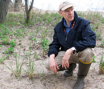 Jim Bissell points out dune grasses at Presque Isle