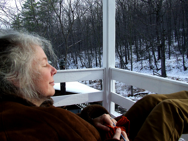 Rachel sunbathing on the Guest House porch