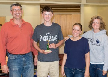 The Shrike Out team won the Towhee Prize with 92 species for Centre County: team members, left to right, Kurt Engstrom, Carl Engstrom, Catherine Farr presenting the award, and Carolyn Mahan (Photo by Mike and Laura Jackson) 