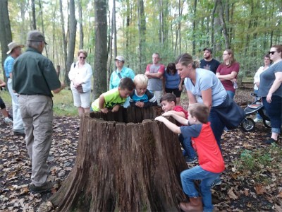 Young and old enjoying a walk in the woods at the Montour Preserve, Montour County 
