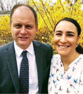 Mark and Paola in the forsythia patch near the house